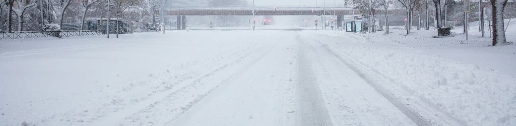 road covered in snow and winter weather