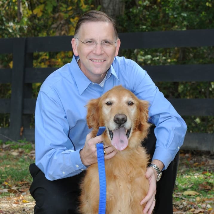 attorney with a golden retriever dog
